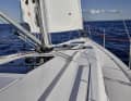 The superstructure is sheer, the hatches recessed