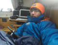 The single-handed sailor visibly exhausted below deck