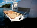 The large platform can be operated electrically. The dinghy garage is available from the Style version upwards