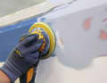 After chemical cleaning to remove waxes or oils, the surface is sanded with 150 grit sandpaper