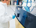 4 To get the colour evenly on the fuselage, work in a criss-cross pattern. Start on vertical surfaces ...
