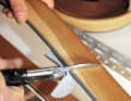 1. the planks are cut to size from the roll using a cutter with a graduated scale