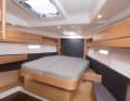 The large owner's cabin with island bed and private bathroom