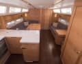 Saloon with U-shaped galley and navigation corner