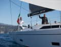 Satisfied. Designer Marco Lostuzzi at the helm of his latest design. First and foremost, he has designed a high-performance ship