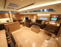 In the version shown at boot Düsseldorf, the navigator sits with his back to the companionway