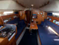 Cosy. Sufficiently large saloon with headroom in the centre. The berths are tight overall