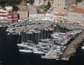 ... In the afternoon it fills up quickly, and there is an adventurous mooring in several rows with bow anchors one behind the other. Not for the faint-hearted