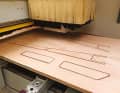 Sawing out the required plywood parts using a CNC router is accurate and saves time