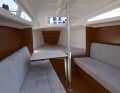 Below deck there are bunks and further aft also a toilet room...