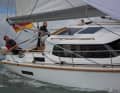 The mighty deckhouse obstructs the view ahead. The helmsman must stand for a clear view forwards