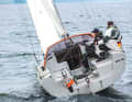 The asymmetrical companionway provides better ventilation for the galley on the port side
