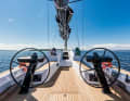 Tidy. The helmsman can reach the traveller line and hydraulic panel, but should concentrate on steering