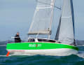 Over the top instead of through the middle. The scow bow of the Mojito 6.50 gets over the waves well