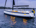 Inviting. The boat has many windows. The wide cockpit creates space for two helm stations