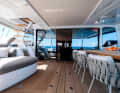 Cockpit and deckhouse merge seamlessly into one another on one level, as is customary in catamarans