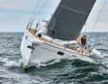 The hull shape is conventional throughout, the superstructure is wedge-shaped