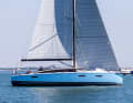 The JPK 39 Fast Cruiser is visually distinctive: flat freeboard, elongated superstructure, ample sail area