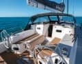 Clear cruising orientation. Mainsheet, halyards and trim lines are operated at the front of the companionway. The winches for the genoa sheets can also be reached by the helmsman. A tarp bracket above the cockpit is available as an option