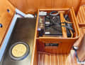 Faurby 370 starter and service battery rest in a central position under the sofa in the saloon