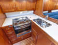 Faurby 370 Large double sink with sea water tap. The storage compartments are perfectly organised