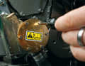 3. open the pump Loosen the screws in the cover of the cooling water pump and ensure that they do not fall into the bilge