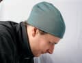 Long hair tied in a plait needs additional space, the cap is then often too short