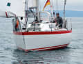 The "African Queen", a half-tonner from the eighties, in light winds in the fjords of Norway