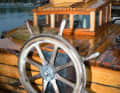 Fleck replaced the massive long tiller around 20 years ago with a convenient hydraulic steering system with a wooden steering wheel