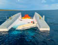 An Outremer 45 drifts upside down in the Mediterranean off Croatia. The crew was caught in a storm cell and capsized