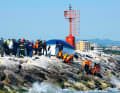 Statt im sicheren Hafen von Rimini endete  der Törn dieser Yacht auf der Steinmole