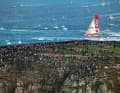 To see the ocean-going racers live, many fans put up with long walks - or accompany the participants in their own boat