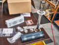The stove includes fuel lines, a pump or a separate tank and the exhaust pipe as well as deflector plates