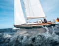 Characteristics: timeless lines, a clear lacquered superstructure, the moderate deck step and a sloping stem