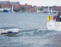 Right: Ideally, the dinghy surfs down the front of its own stern sea. This way it generates hardly any pull