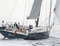 The running deck is not extended laterally to the rear. The helmsman sits far outboard