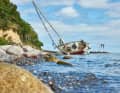 High and dry: stranded yacht of a single-handed sailor off the island of Langeland