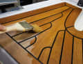 One application method is brushing, which is recommended for small areas and in tight corners. The product is quite economical