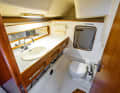 Low: the large wet room with oil locker. However, there is a lack of height above the WC