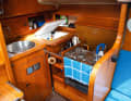 Deficiency: Everything there except enough worktop space. The cupboards reach right into the baking box. The cooker with oven is standard