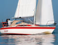 Comfortable seating on the flattened coaming. Wide gangways and a narrow superstructure take up a lot of space inside. The sloping cabin in front of the mast takes away headroom from the toilet room