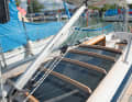 Characteristic features are the high bracket on the companionway and the hatch with Plexiglas garage