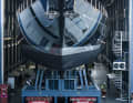 Two heavy transports pull the aluminium construction to the surface.
