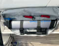 The carrying bag is included, but unfortunately the holder does not fit inside. Padding would be desirable.