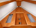 Bavaria Cruiser 33: Storage space under the sunbed is limited. The water tank is installed right at the front