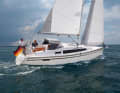 Modified deck, two wheels. The backstay gets in the way if you want to steer sitting upwind