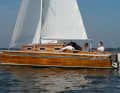 The "Lumme" is a dinghy cruiser in a class of its own. Yet she looks so tranquil from the outside