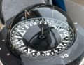 The compass symbolises a time when navigators were regarded as demigods and weather routing was considered black magic