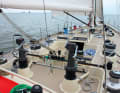 A winch for each line, halyard control near the mast and a small working cockpit from today's perspective