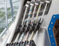 Reefing lines and halyards run on the coaming. The pulleys for these are self-made